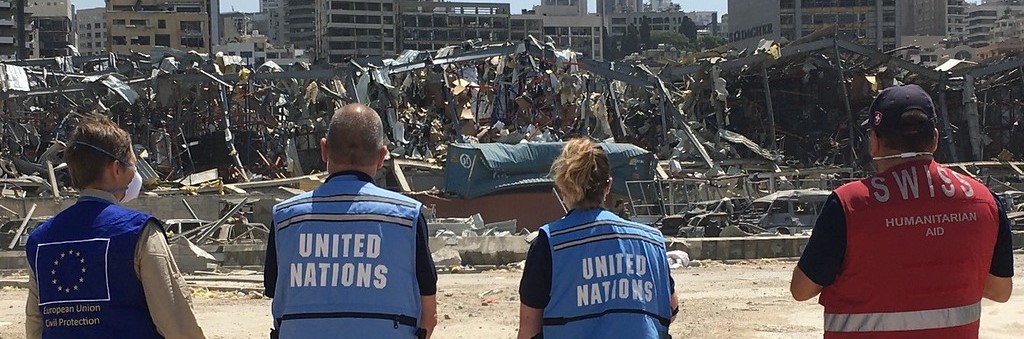 EU, UNDAC and Swiss Humanitarian Aid Members standing in front of the rubbles of the Port explosion in Beirut, Lebanon, 2020.