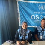 Two UNDAC members participating in the Fiji National Simulation Exercise, manning the On-Site Operations Coordination Centre (OSOCC).