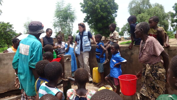 UNDAC Member speaking to community members of Kalima Village.